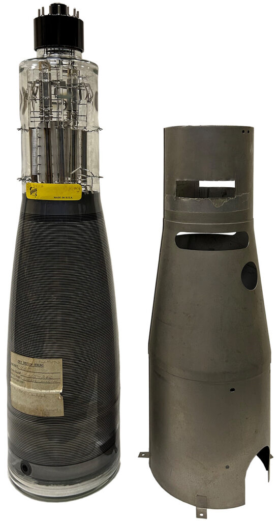 Two different military missile nose cones placed side by side on a white background.